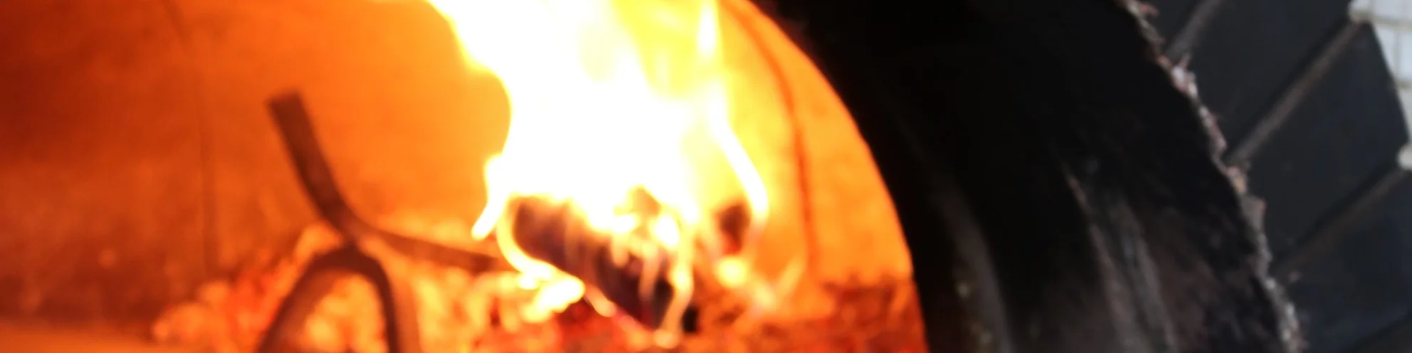 Wood-fired pizza with fresh toppings from a traditional oven