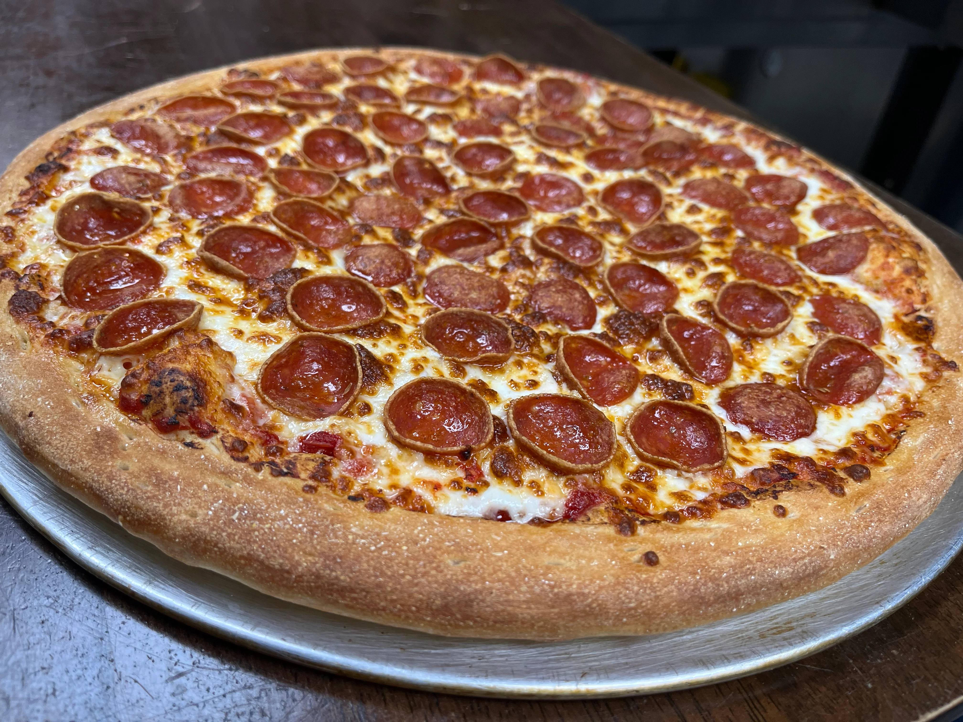 Pepperoni pizza with a golden crust and melted cheese