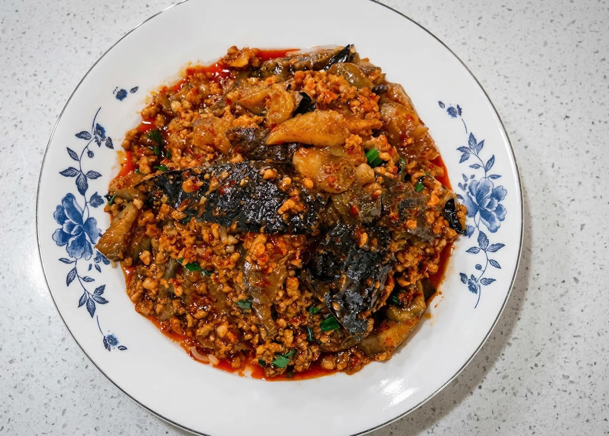 Spicy Sichuan fish dish with minced meat