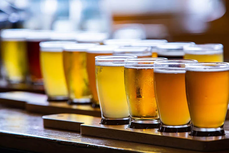 Flights of beer in tasting glasses