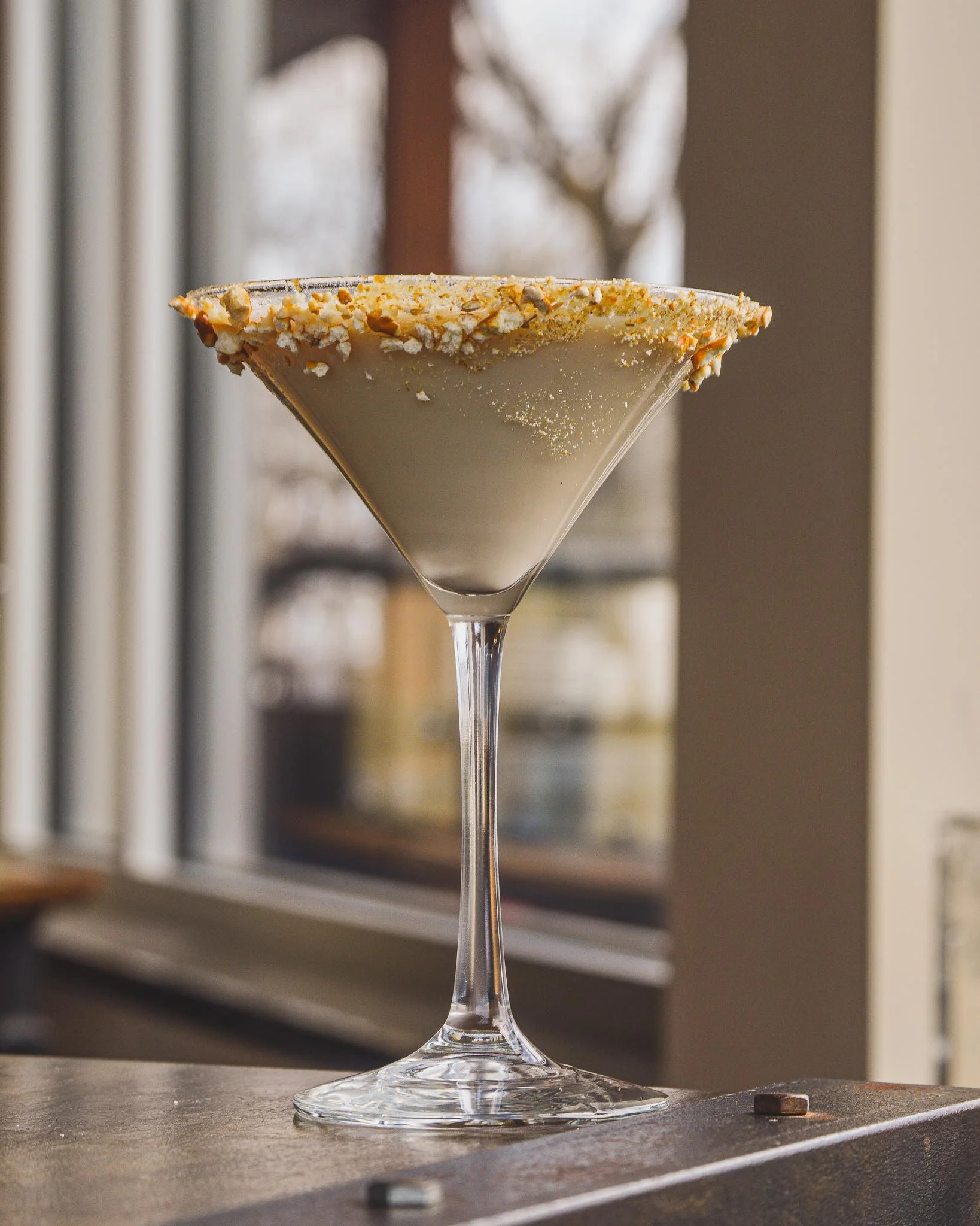Salted Chocolate Martini with a window behind it