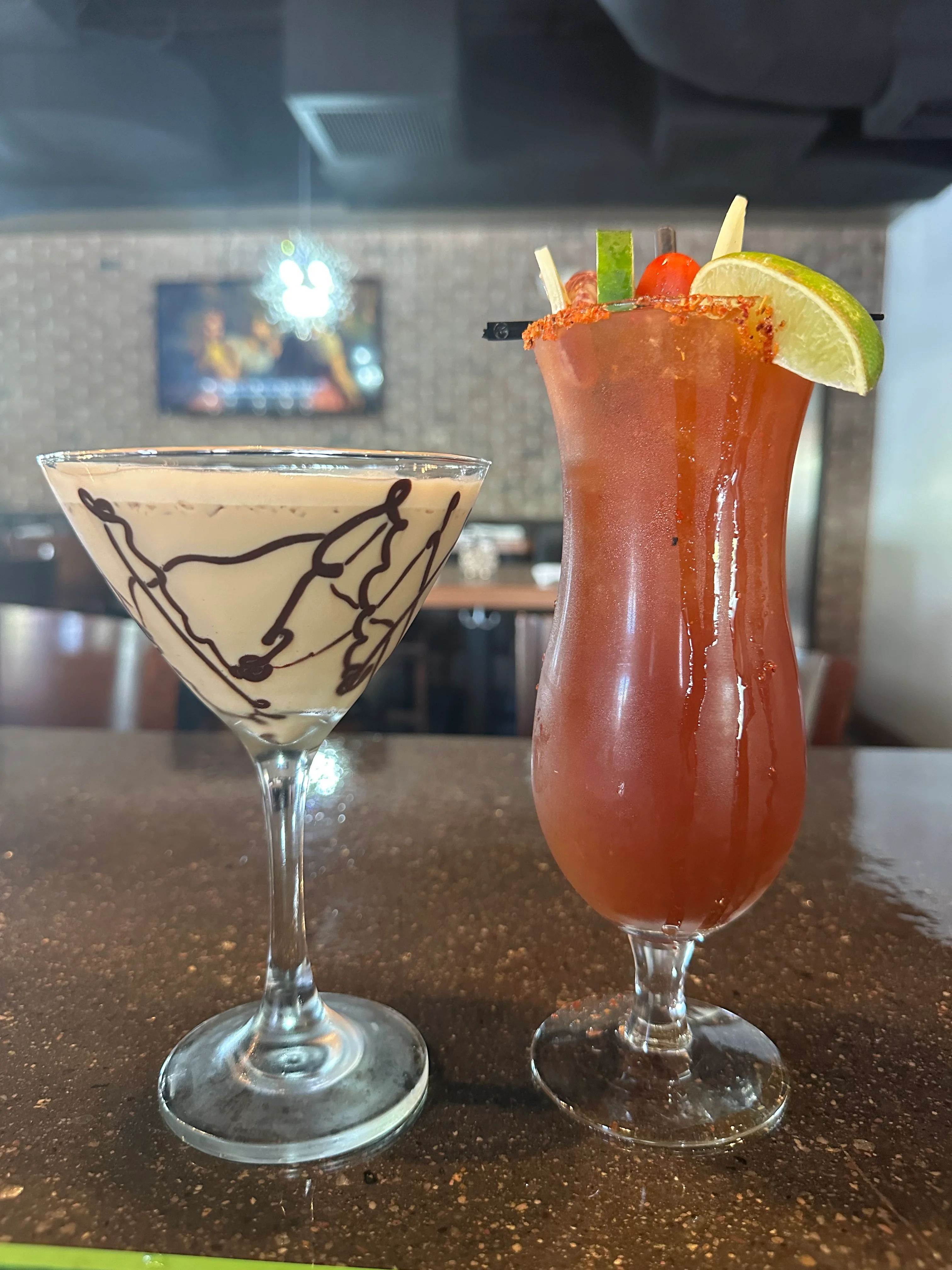 Two cocktails: a chocolate martini and a spicy Bloody Mary