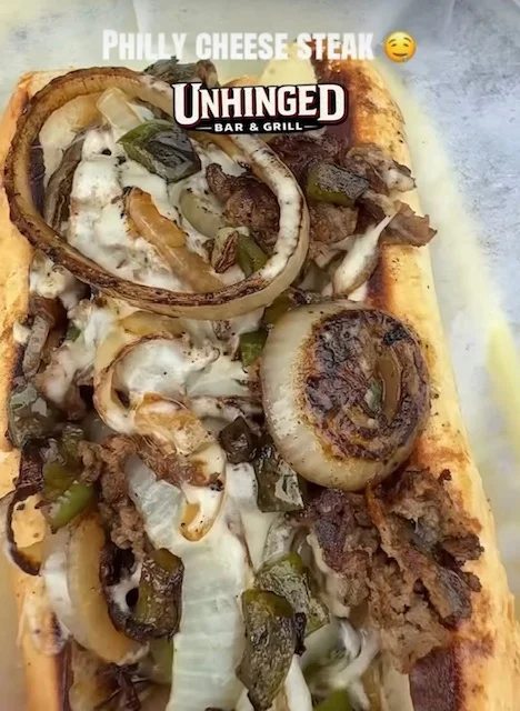 Delicious Philly cheesesteak with grilled onions and peppers