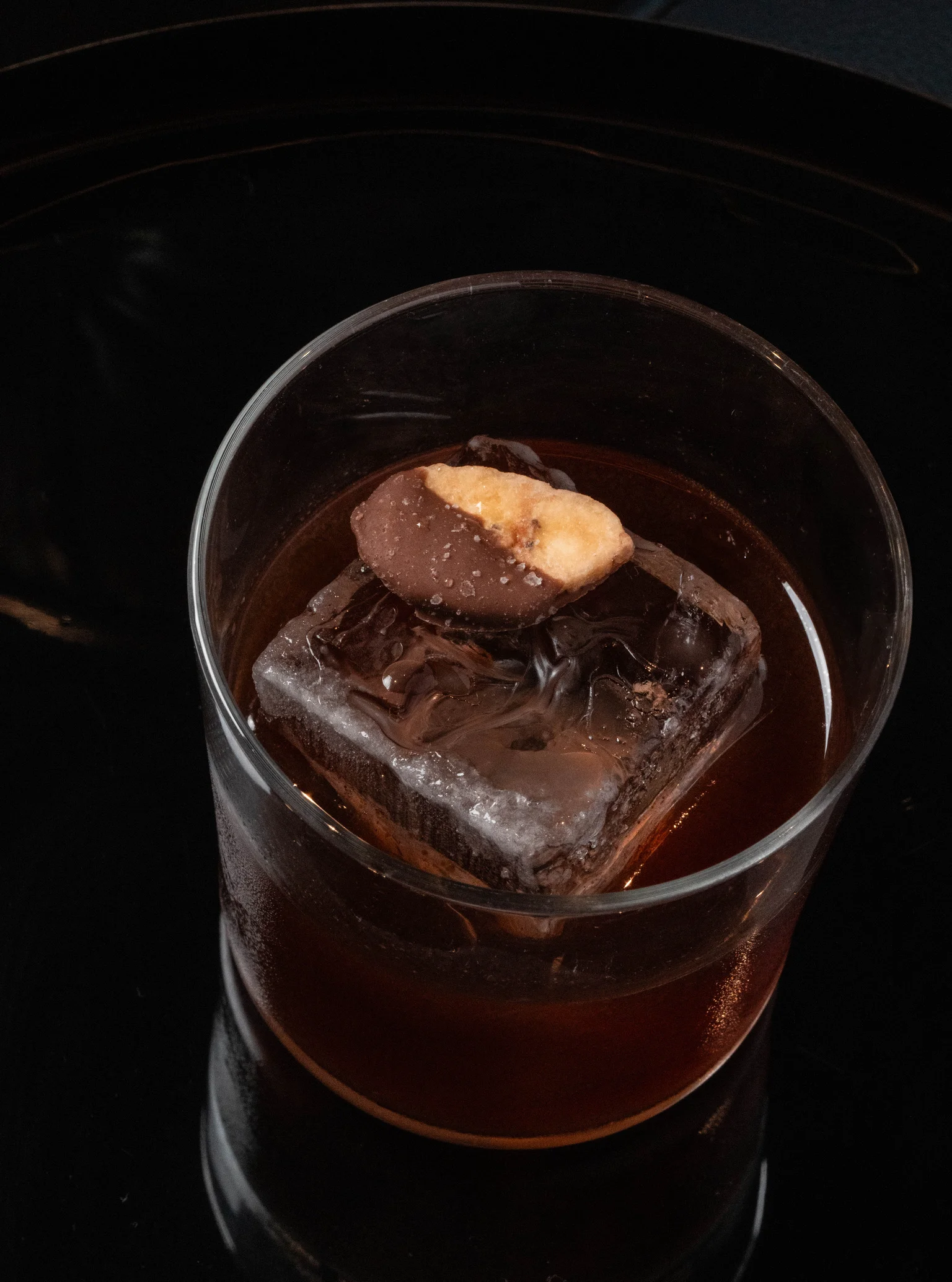 Bolero. Black Mole-Washed Abasolo Corn Whisky, Brucato Woodlands Amaro, Nixta Corn Liqueur, Banana