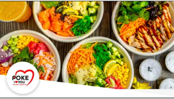 Colorful poke bowls with fresh seafood and vegetables