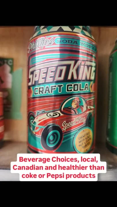 A colorful soda can featuring 'Speed King Craft Cola' with a racing theme and bold graphics.