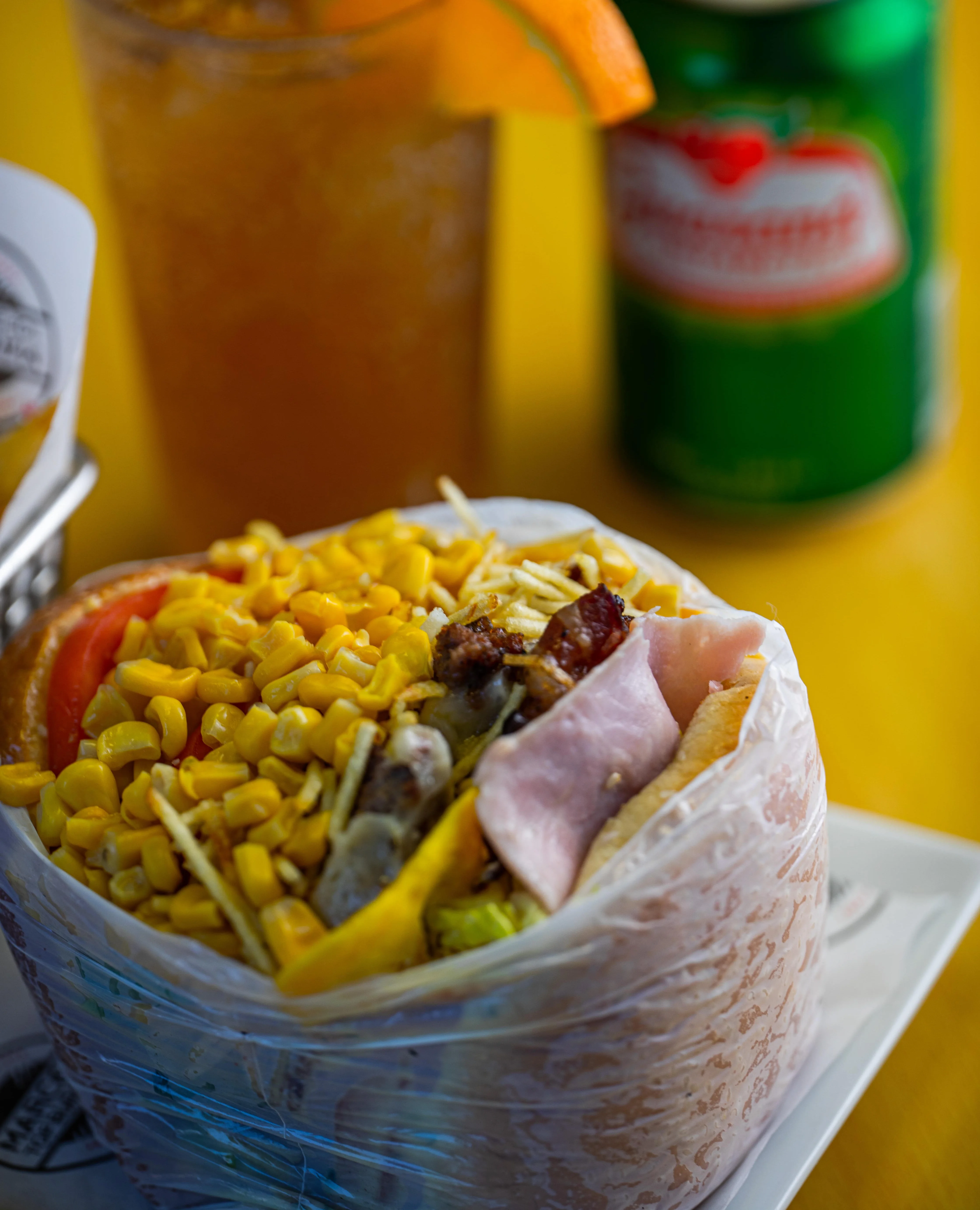 Delicious Mexican burrito filled with corn and meats