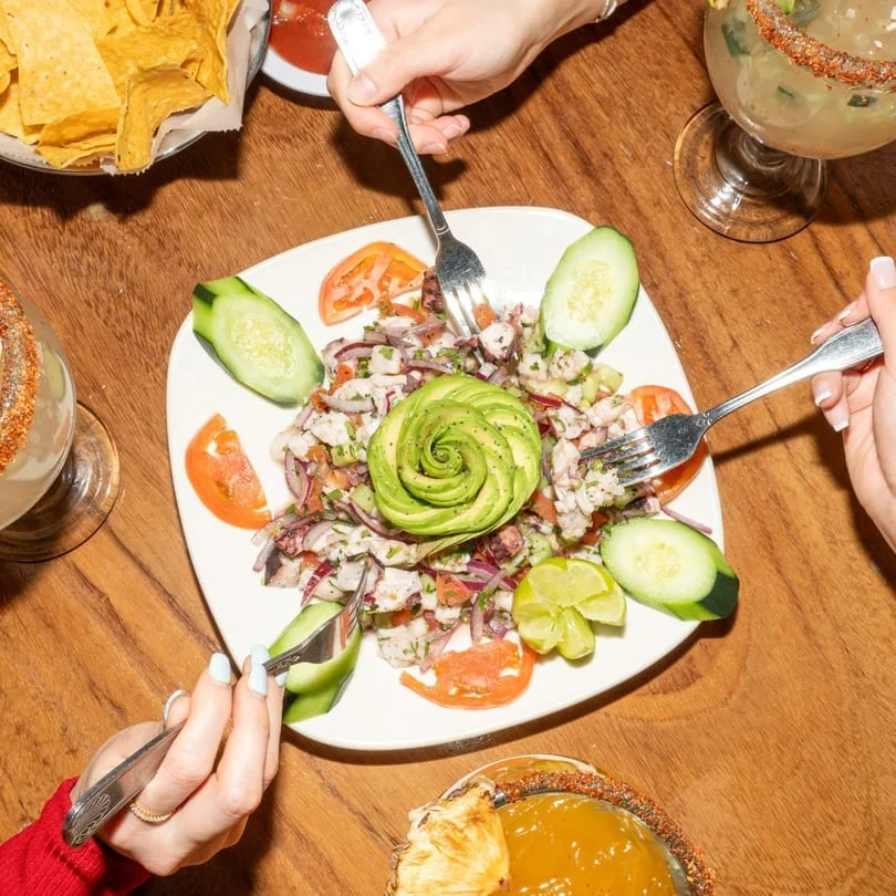 Delicious gourmet burger with fresh toppings on a wooden table