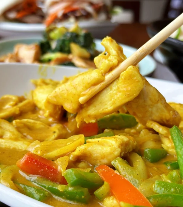 Creamy Thai yellow curry with chicken and vegetables