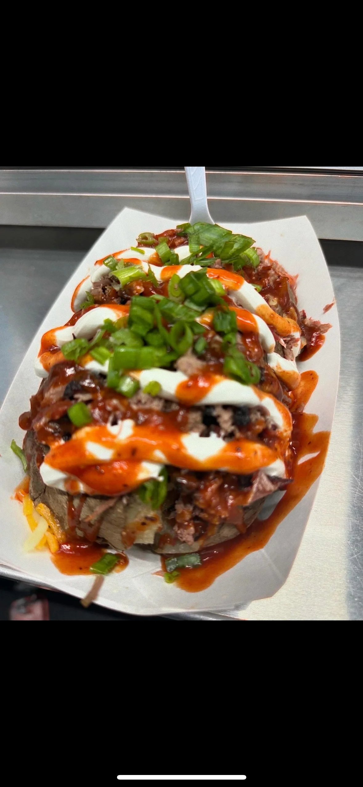 Loaded Mexican baked potato with toppings
