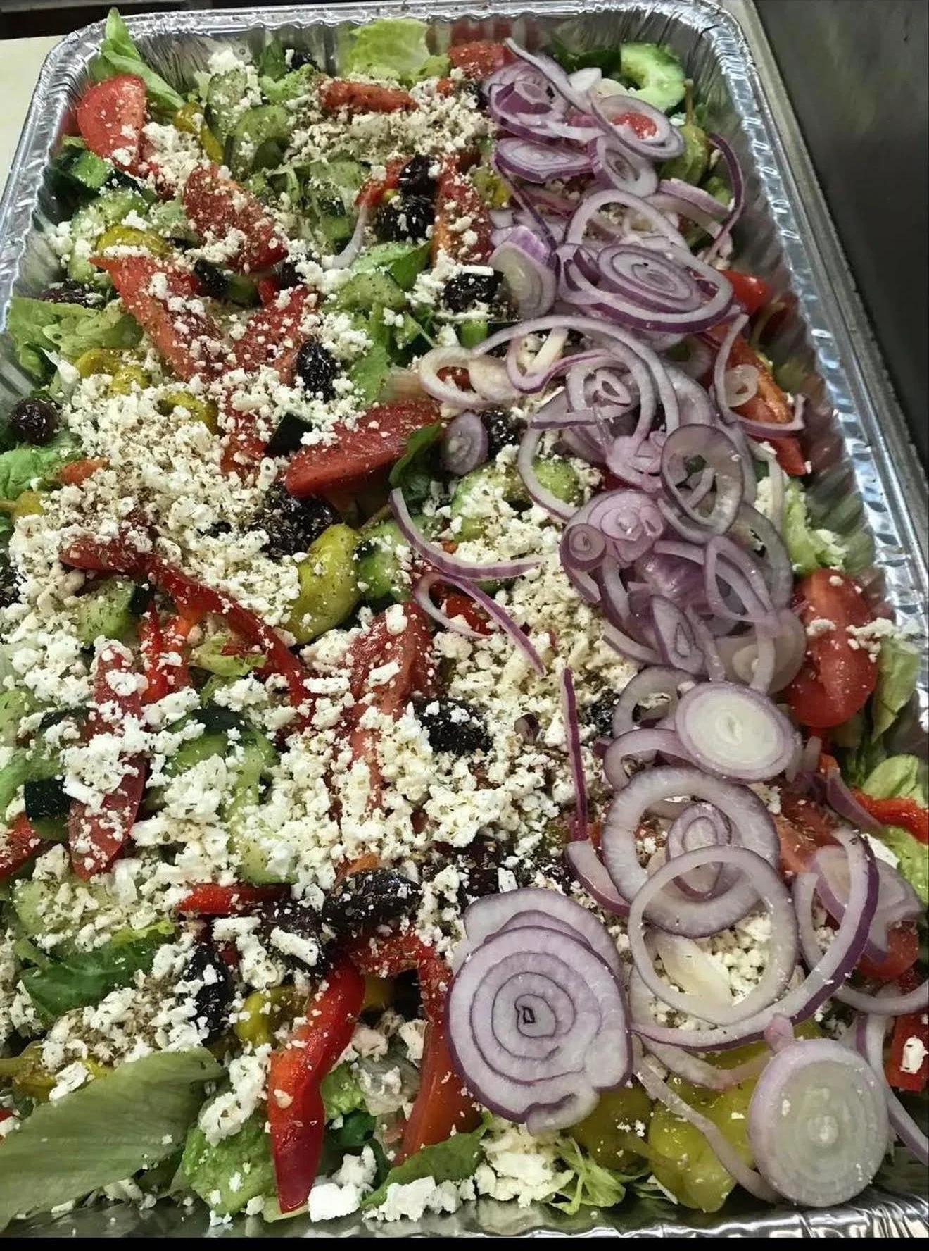 Colorful Mediterranean salad with feta cheese and fresh vegetables