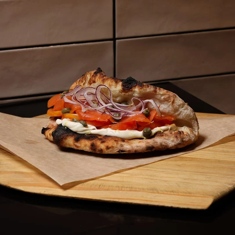 Freshly made Lebanese manakish with vegetables