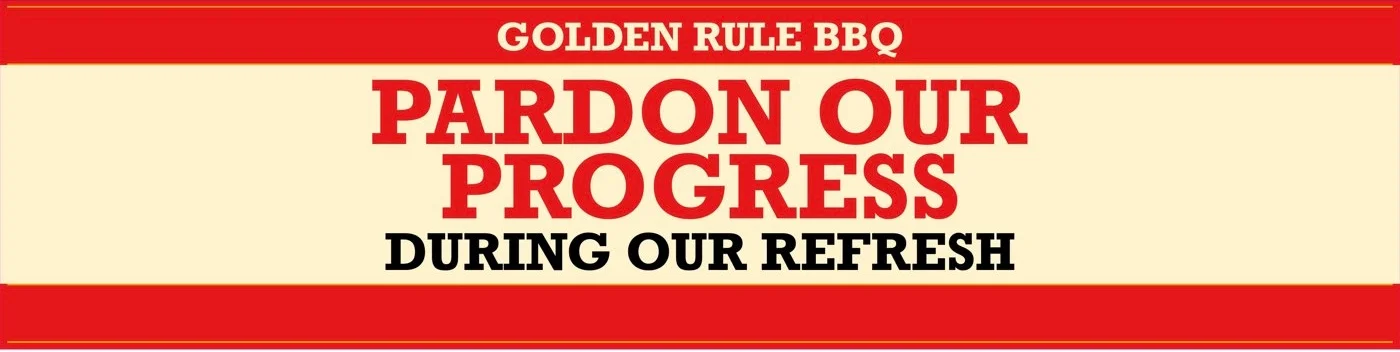Restaurant renovation notice sign with bold red and cream typography
