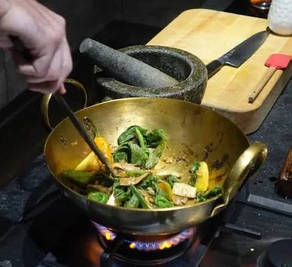 Stir-fried Thai vegetables in a wok