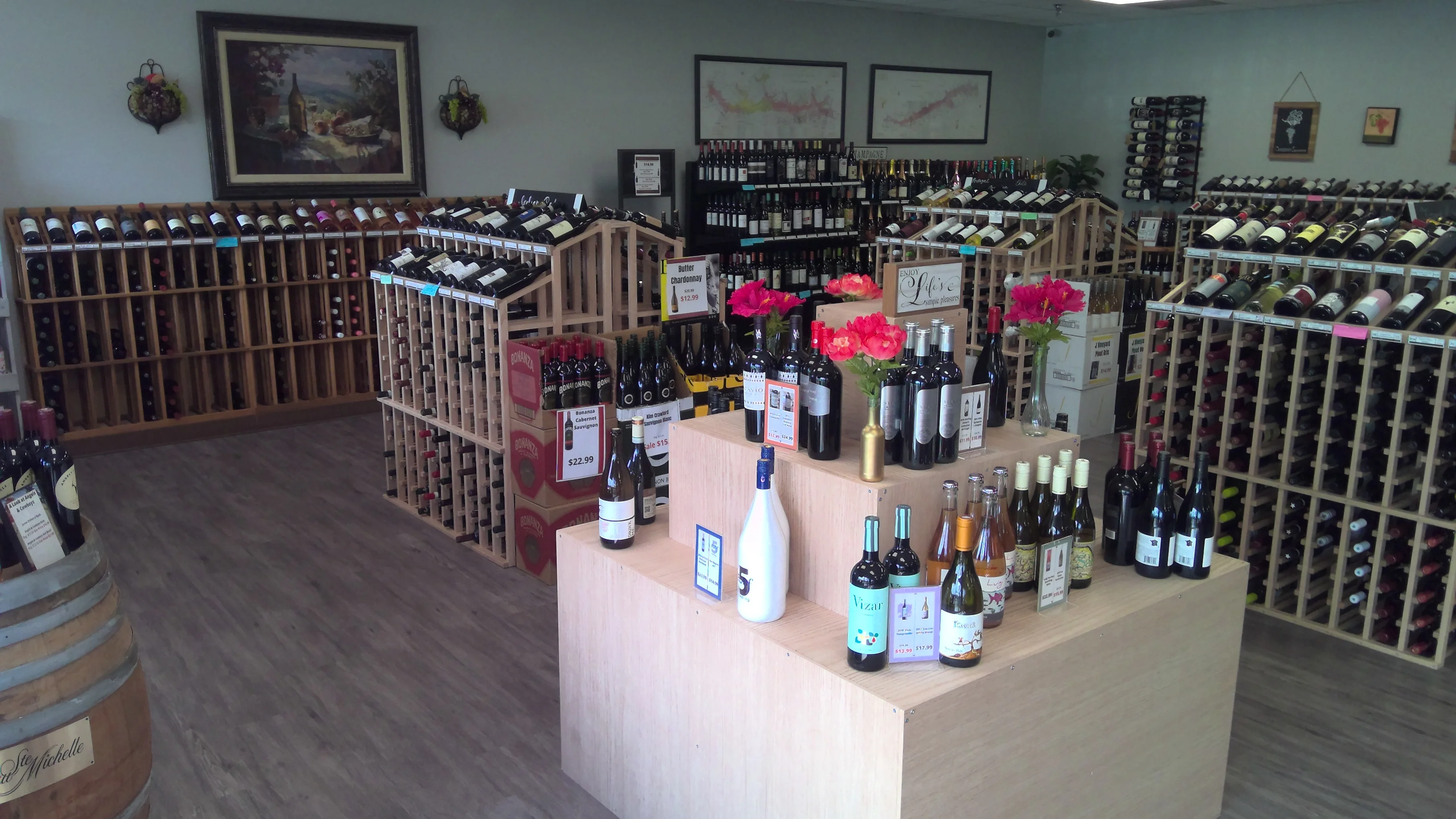 Wine shop interior with diverse selections and floral decor