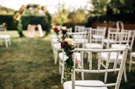 Elegant wedding setup with floral decorations and a beautifully arranged table.