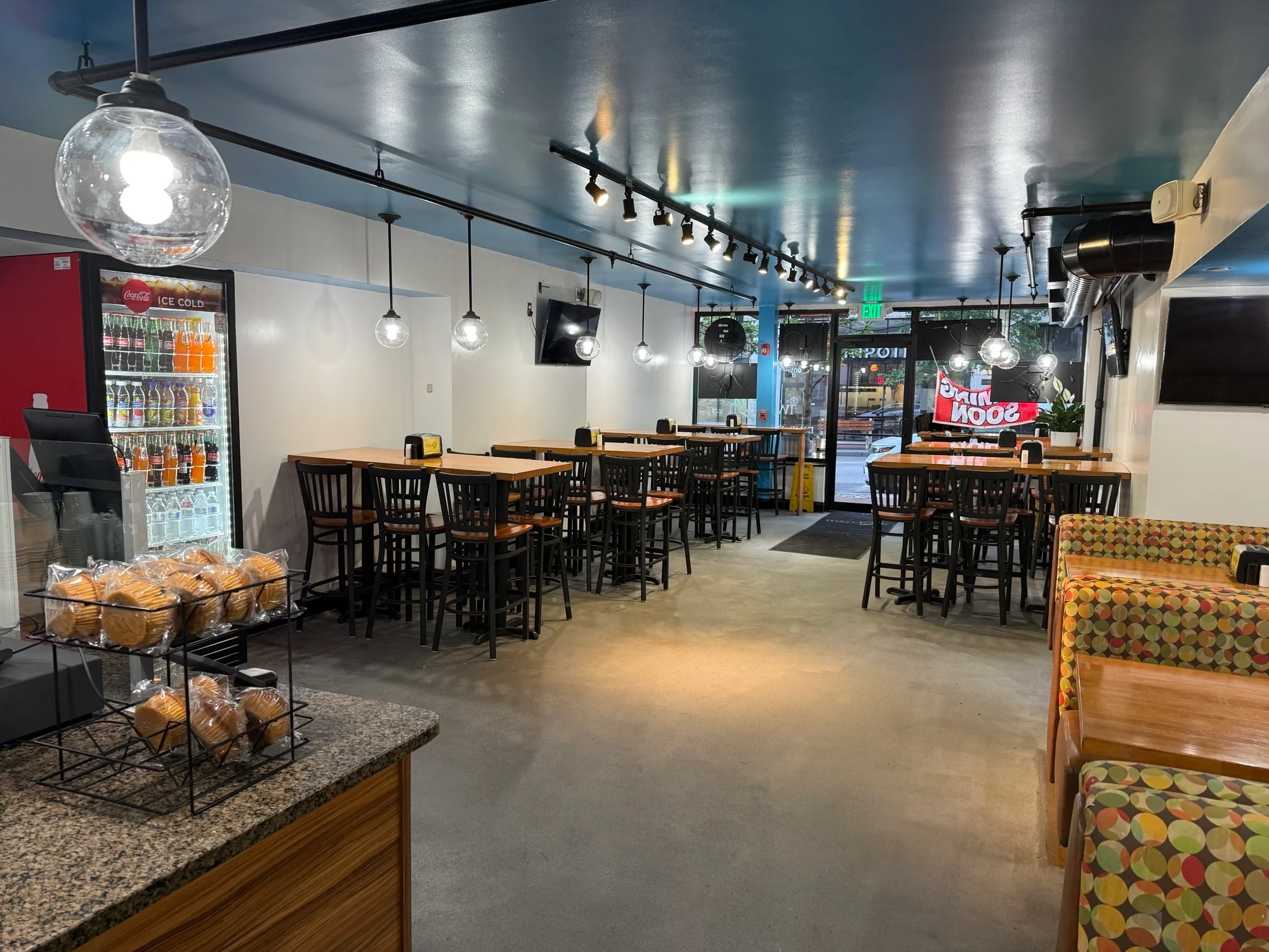 Delicious gourmet burger with fresh toppings on a wooden table
