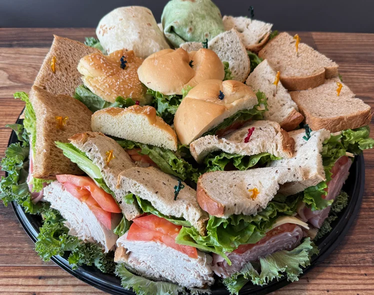 Catering platter with assorted deli sandwich wedges