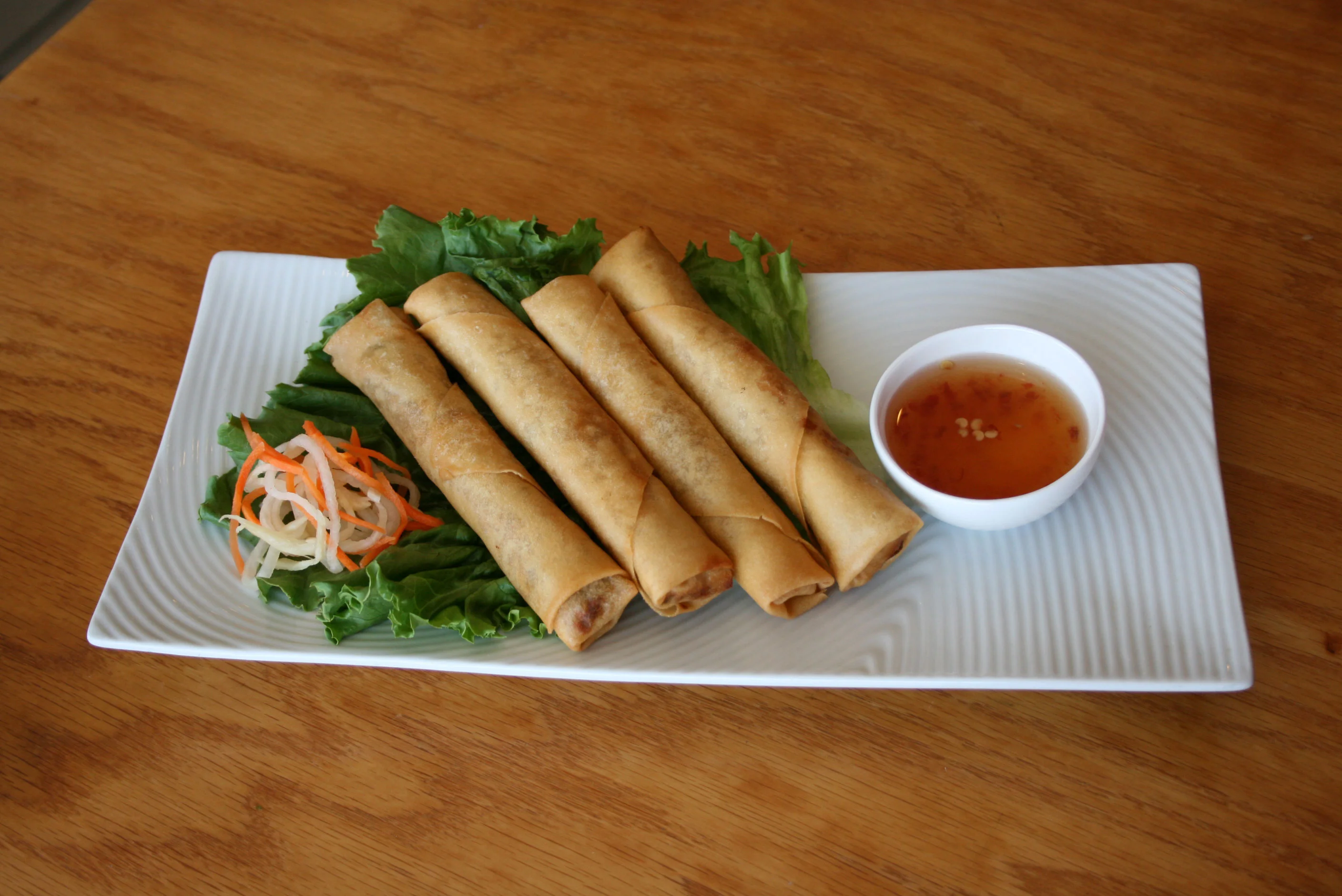 Crispy Vietnamese spring rolls with dipping sauce