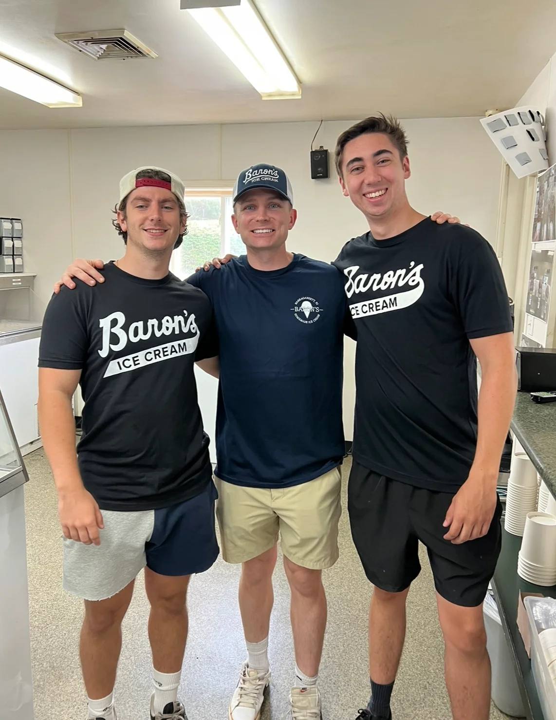 Team members at Baron's Ice Cream shop posing together