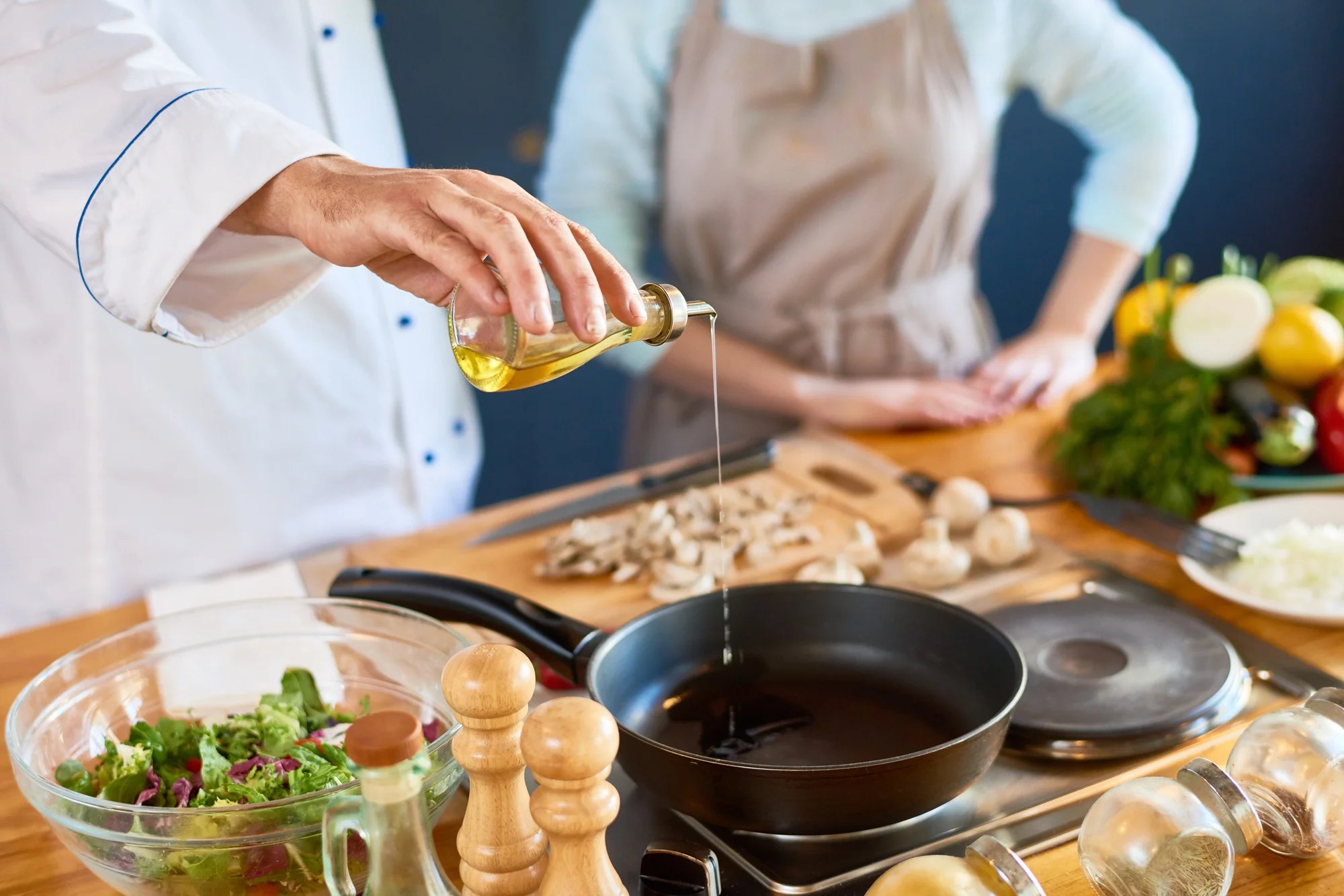 Healthy cooking class with fresh ingredients and participants learning.