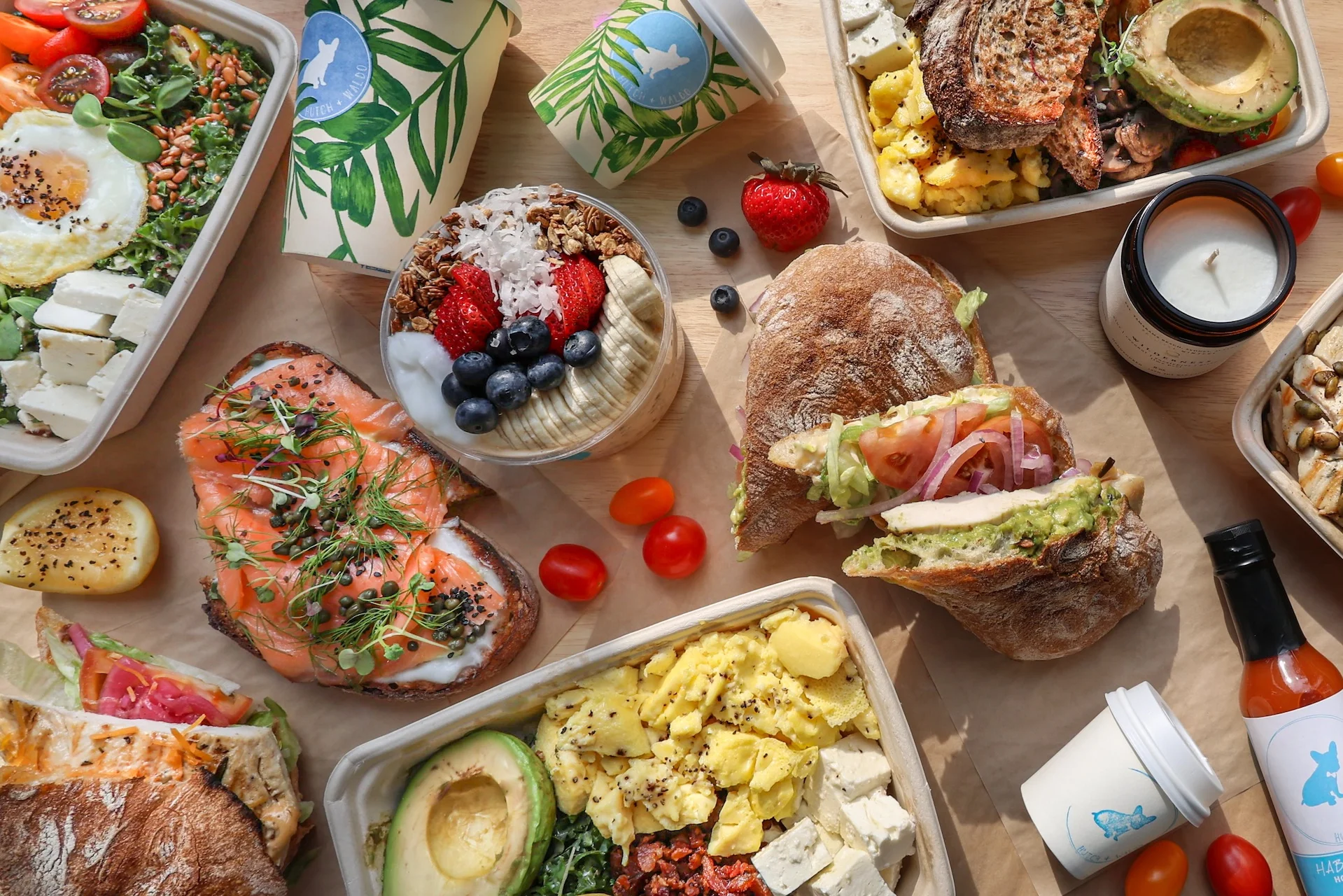 Colorful brunch spread featuring avocado toast and smoothie bowl