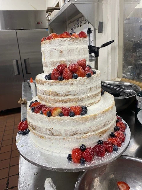 Semi-naked tiered cake with mixed berries from The Kosher Pastry Oven