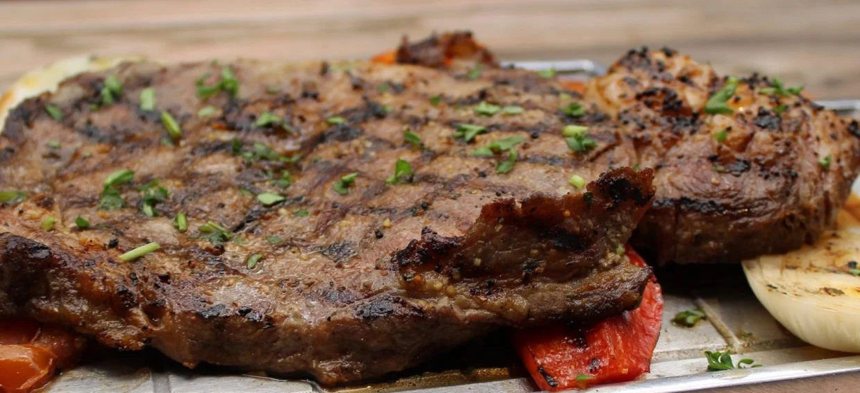 Sizzling Argentine steak served on a hot plate