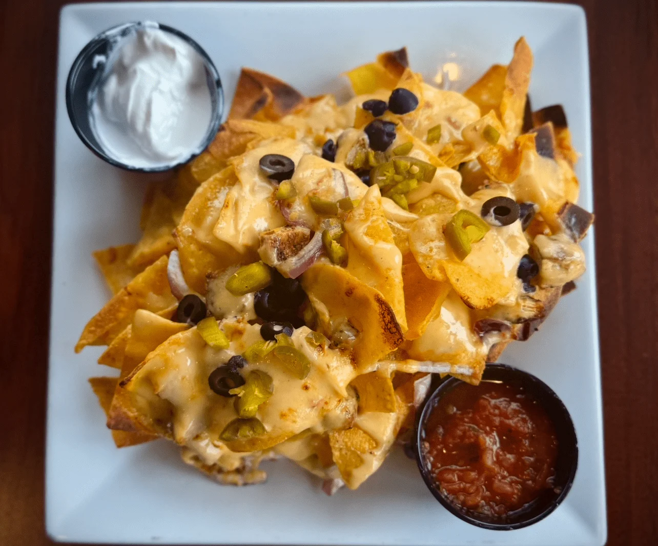 Loaded nachos with cheese and toppings