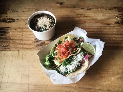Authentic Mexican tacos with a side of black bean soup