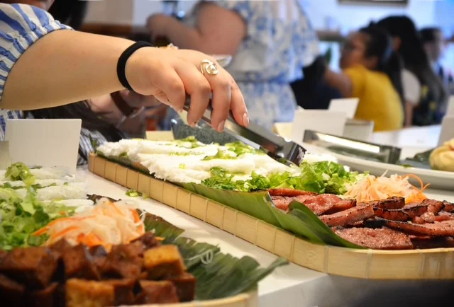 Vietnamese banh mi ingredients being prepared on a platter