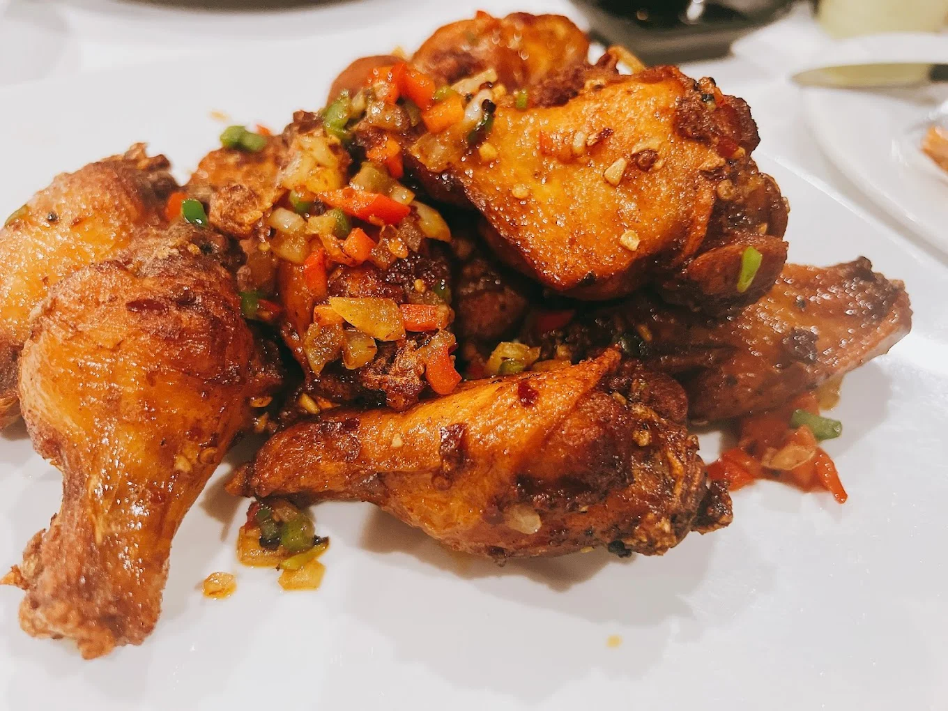 Crispy Nigerian chicken wings with spicy pepper sauce