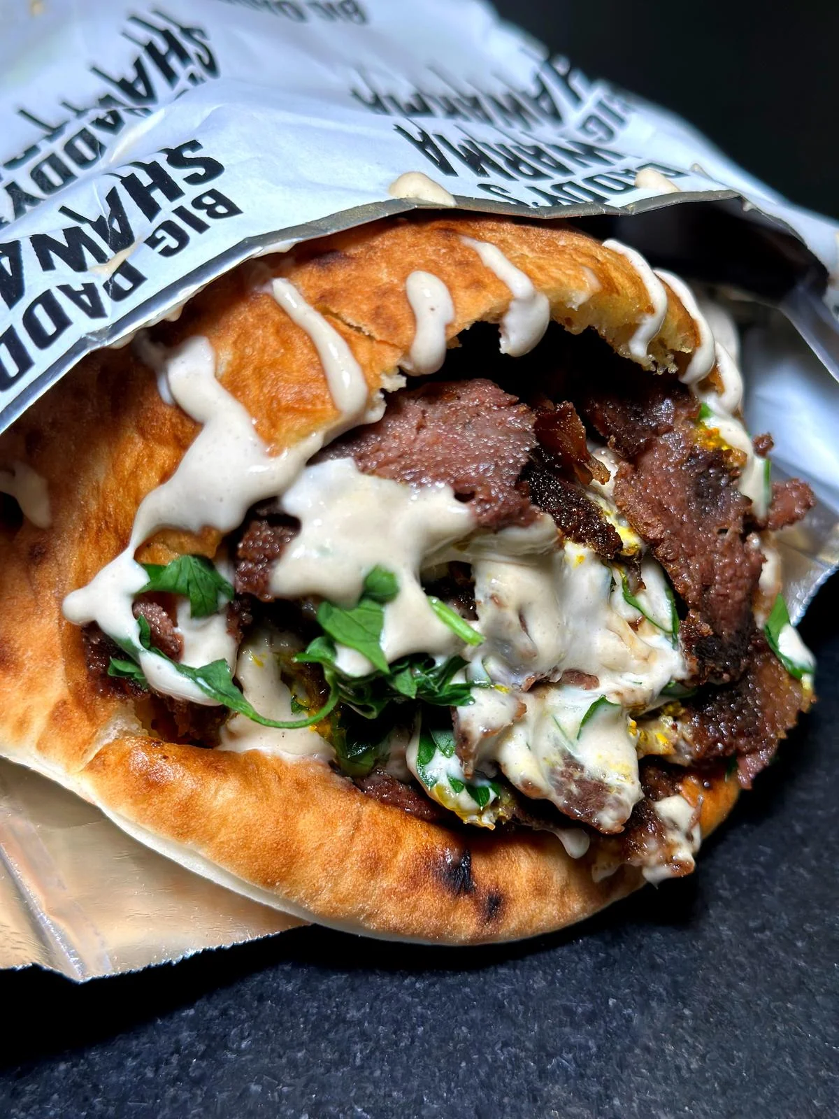 Delicious shawarma wrap with tender beef and tahini sauce