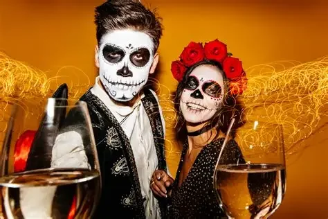 Día de los Muertos celebration with calavera makeup and wine glasses