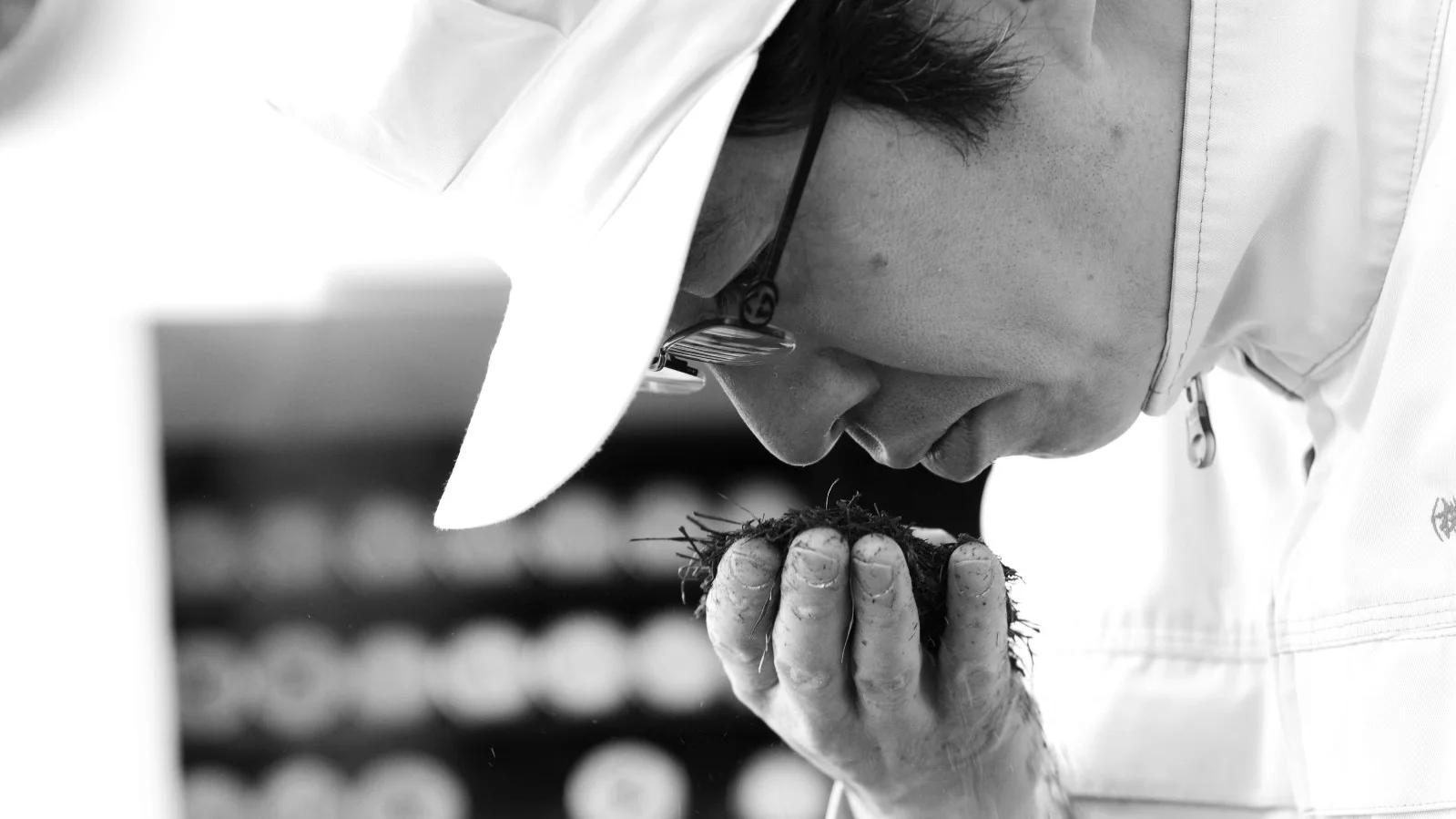 Chef examining fresh truffles with care