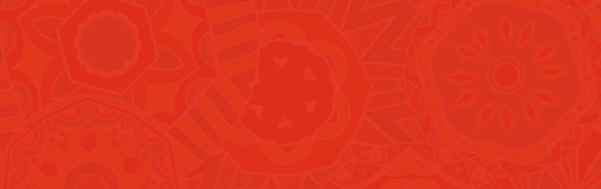 Vibrant red patterned background with intricate designs