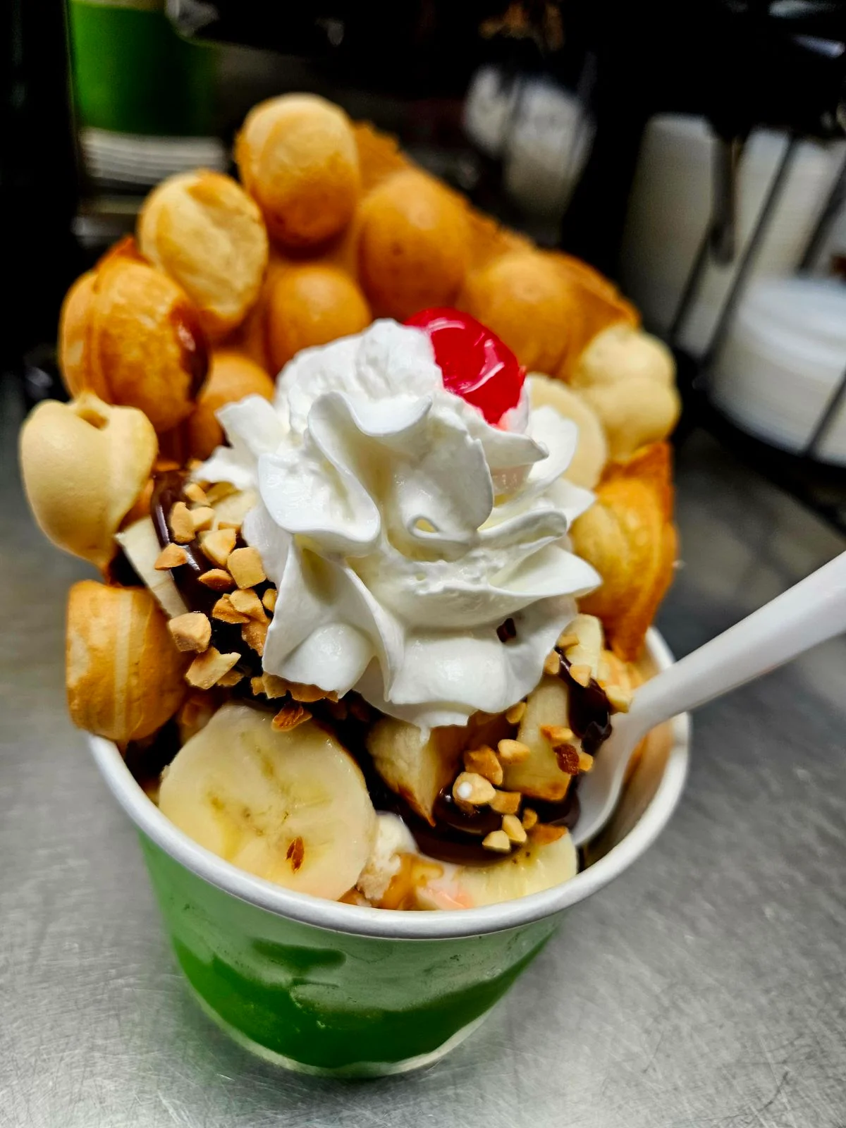 Delicious Hong Kong-style egg waffle dessert with ice cream and toppings