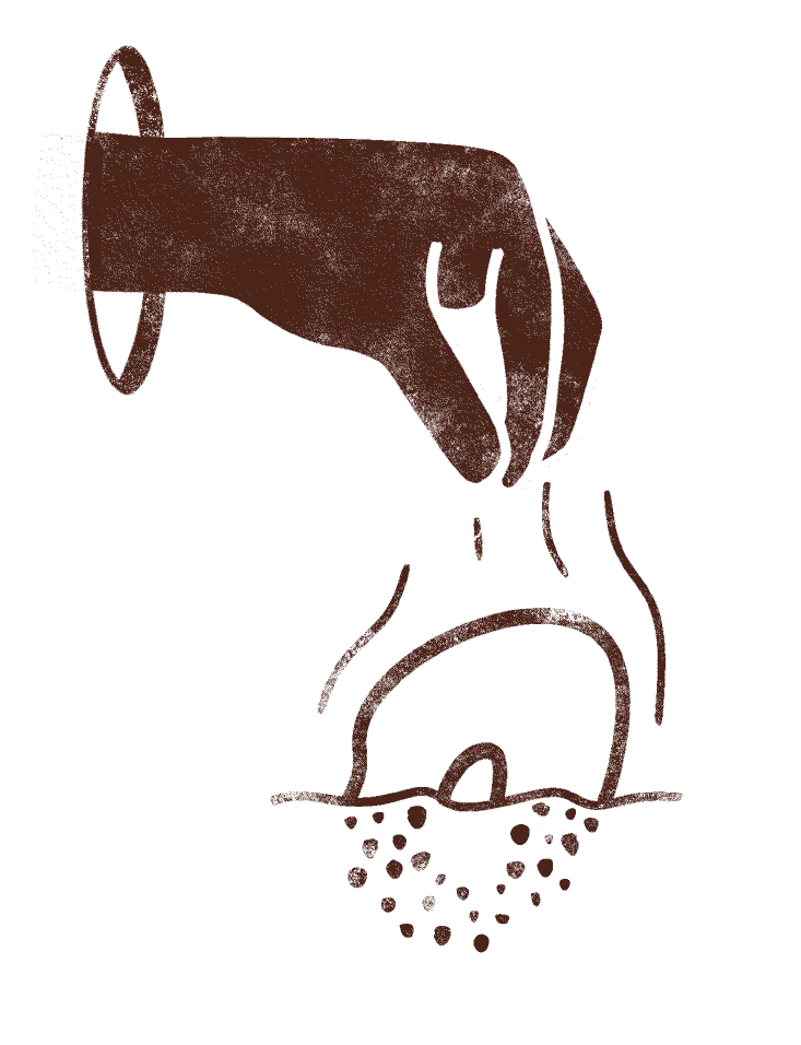 Hand frying donut in oil