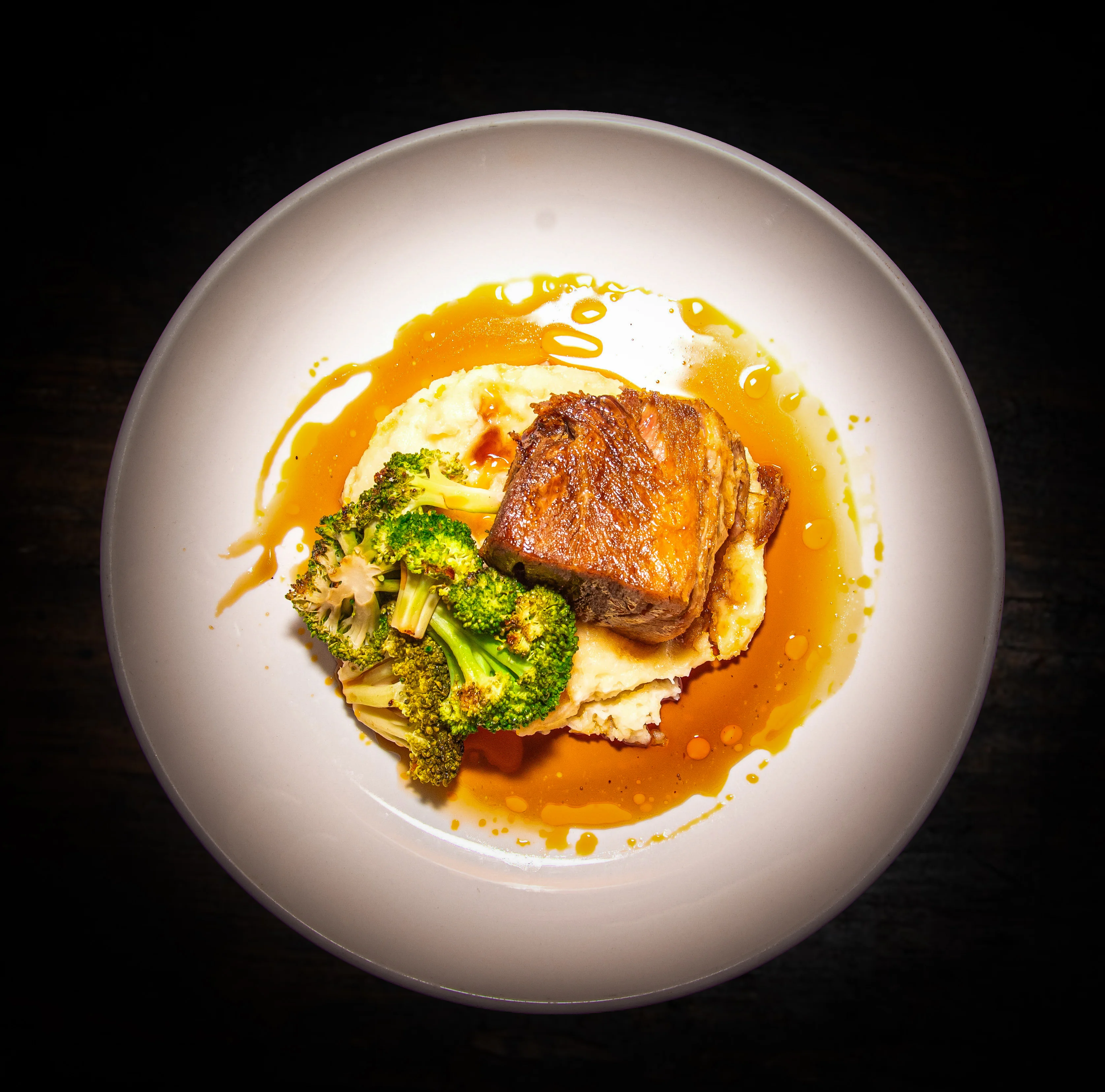 A restaurant chef preparing a dish