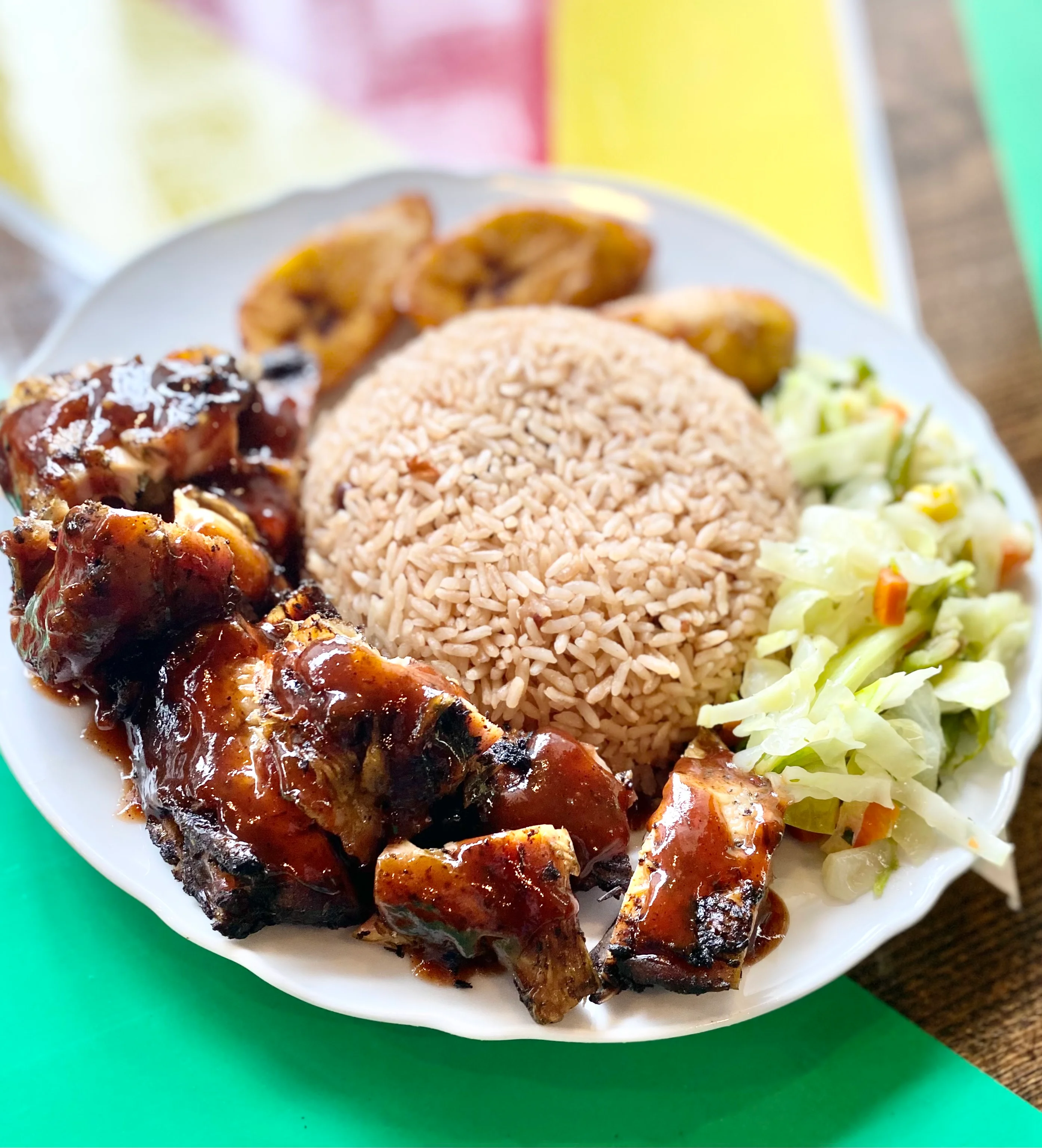 Jamaican jerk chicken with rice and peas