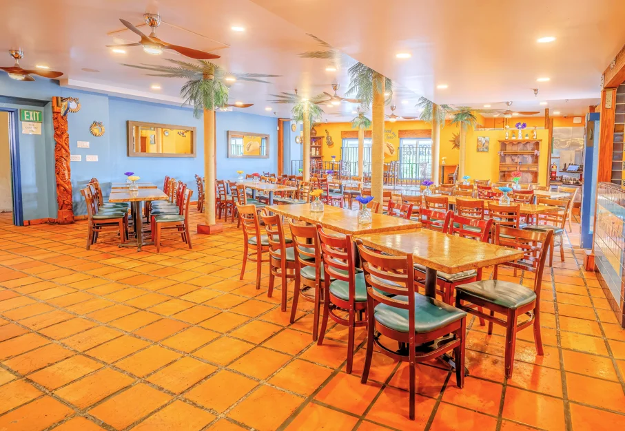Vibrant restaurant interior with colorful decor and tiled flooring