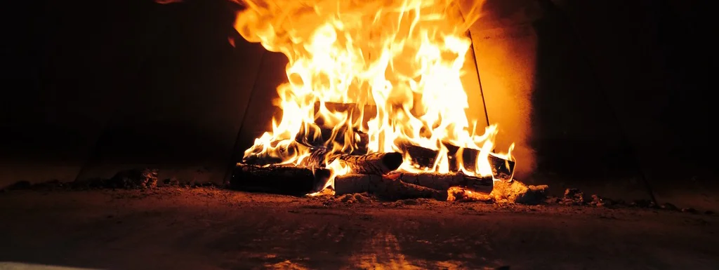 Flames dancing in a wood-fired oven