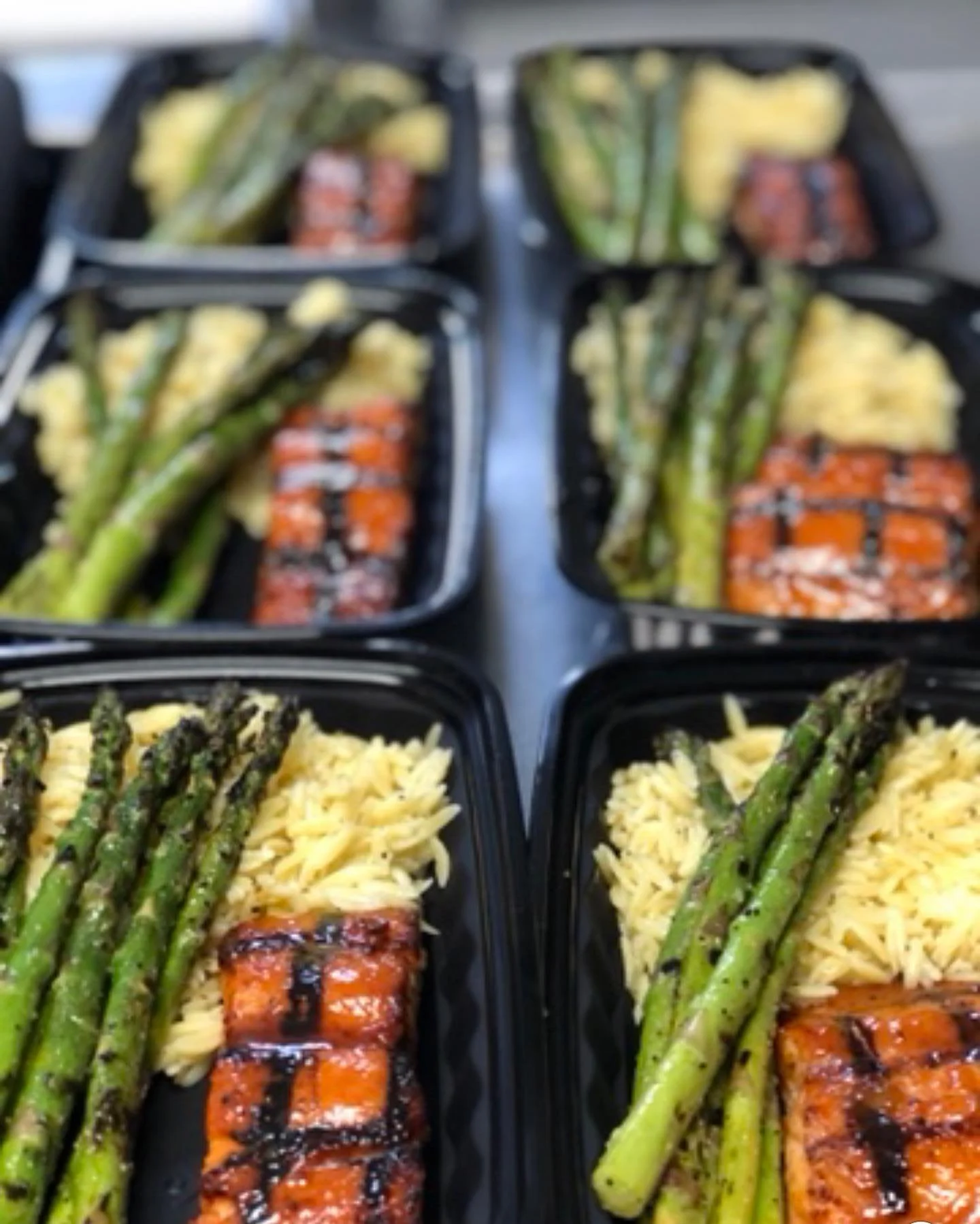 Grilled salmon with asparagus and orzo, a healthy meal prep option