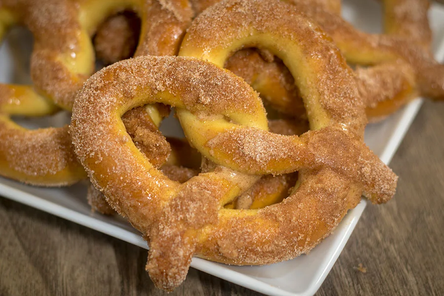 Cinnamon sugar pretzels on a white plate