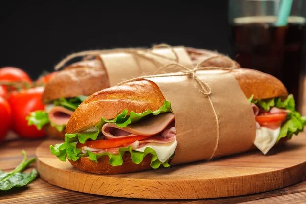 Italian sub sandwich wrapped in paper