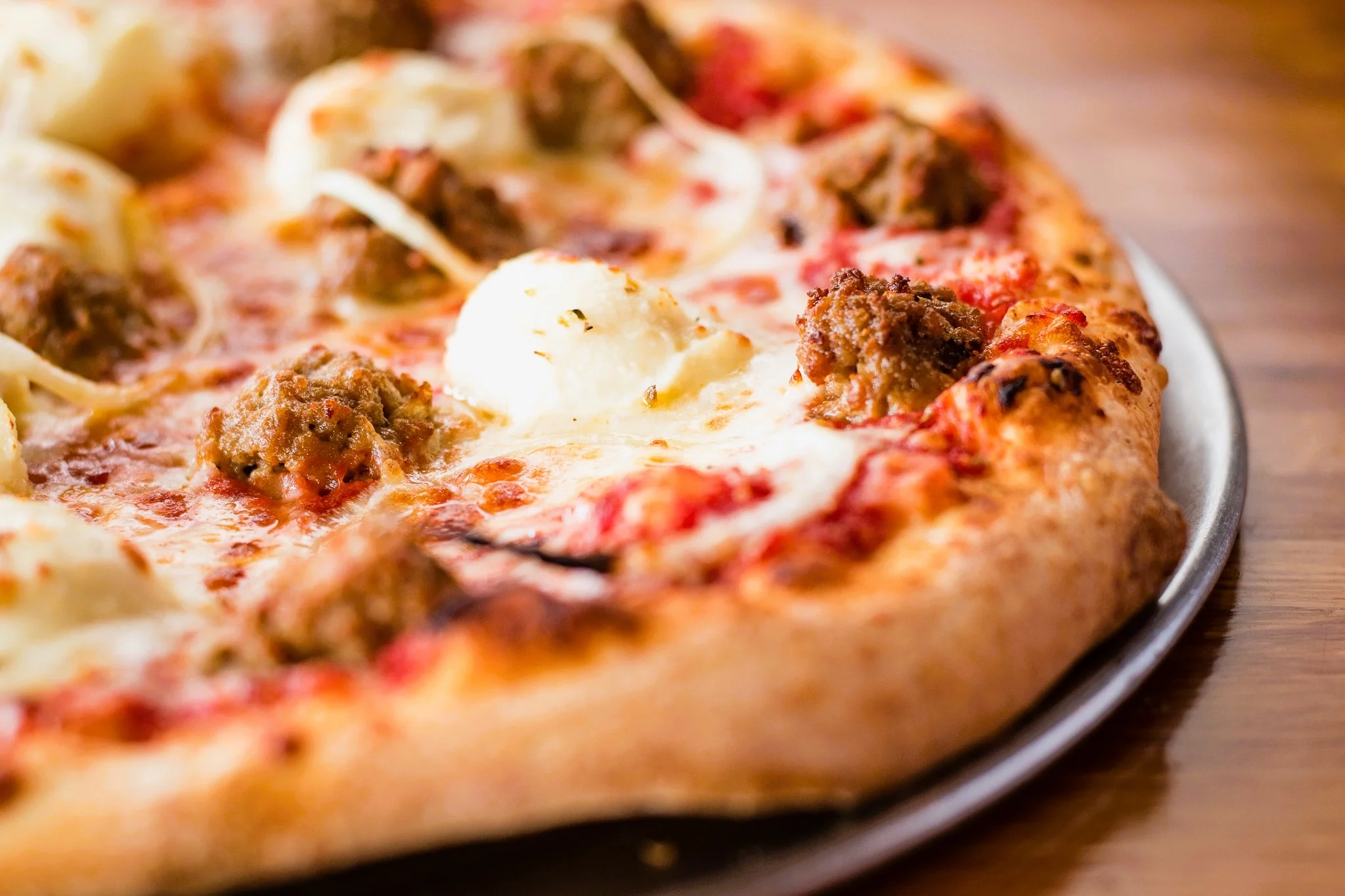 Italian meatball pizza with mozzarella and marinara sauce