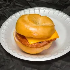 Bagel sandwich with cheese and sausage