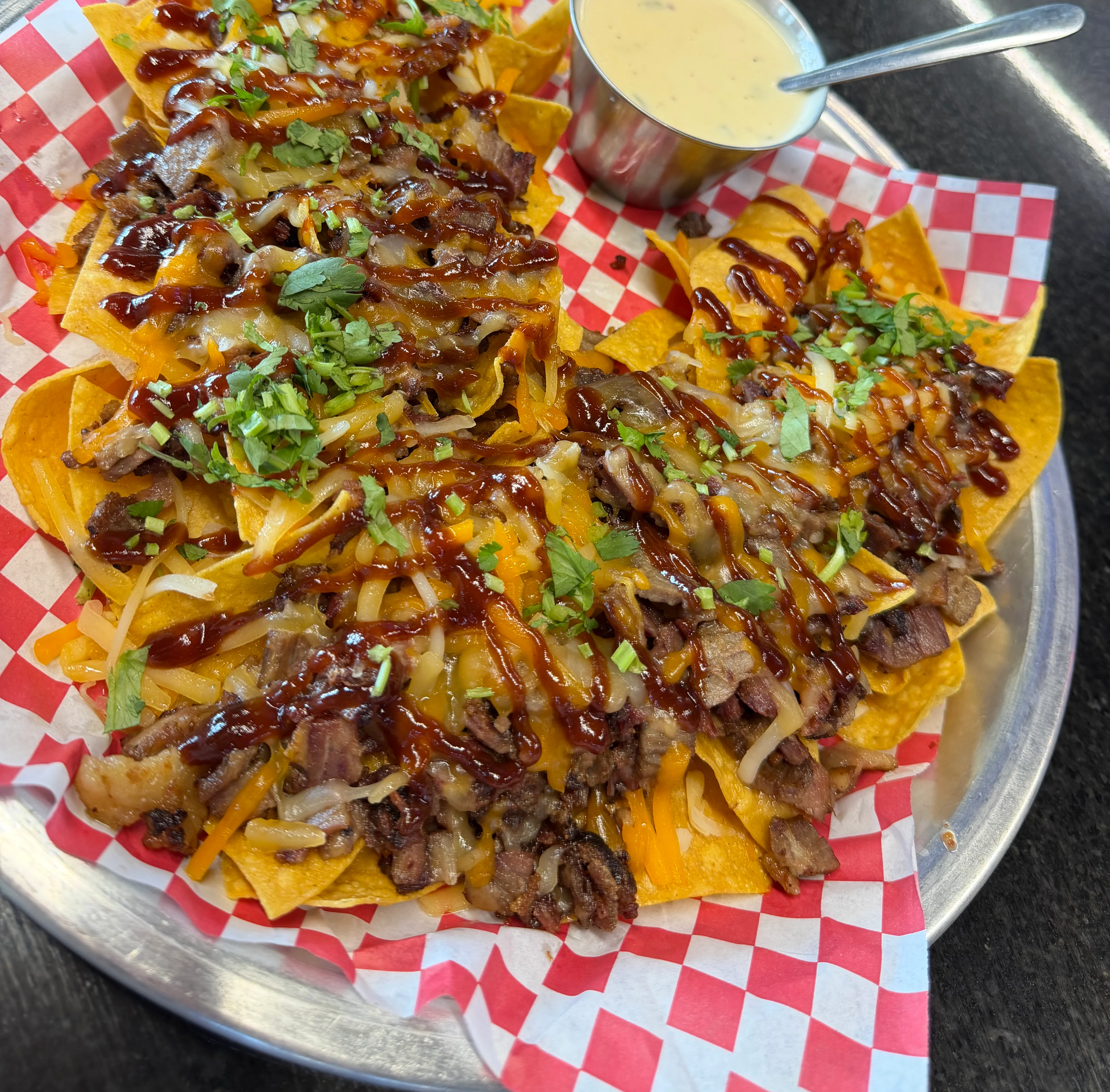 Loaded nachos with beef and cheese sauce