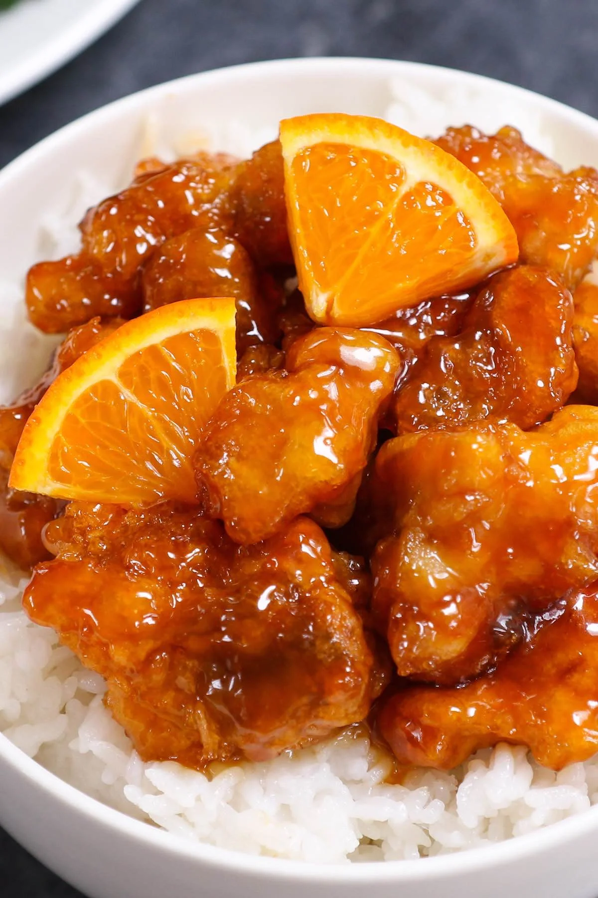 Orange chicken served over steamed rice