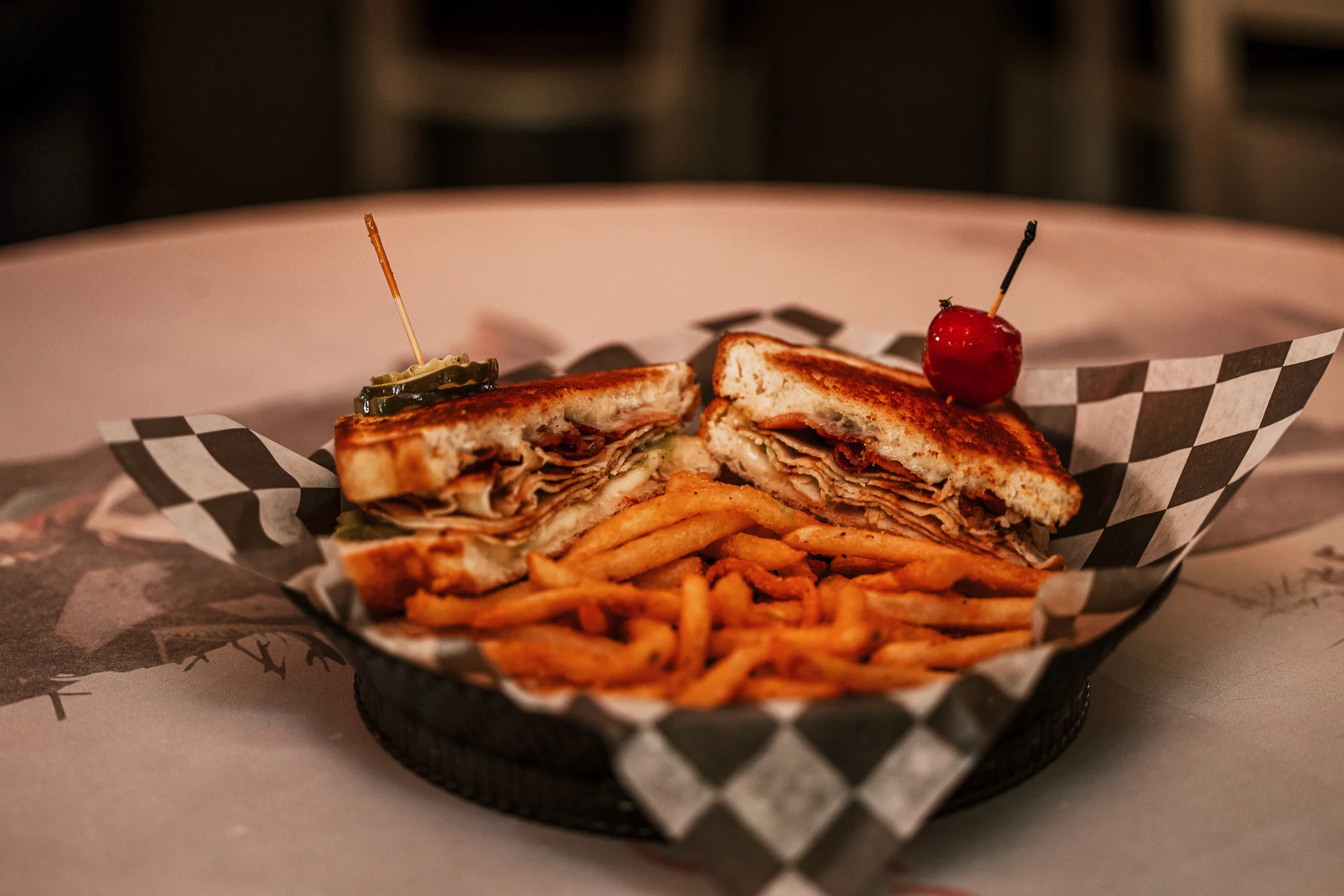 Classic deli sandwich with fries and pickles